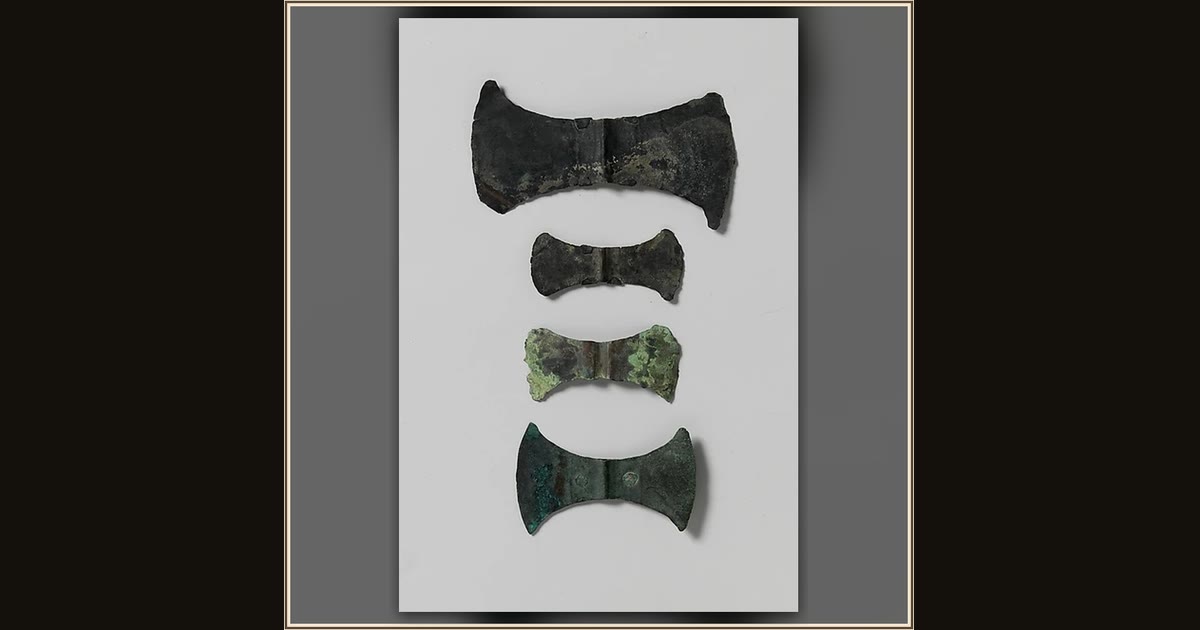 Bronze double-ax head by Unknown