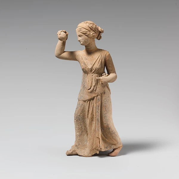Terracotta statuette of a girl playing ball, The Metropolitan Museum of Art
